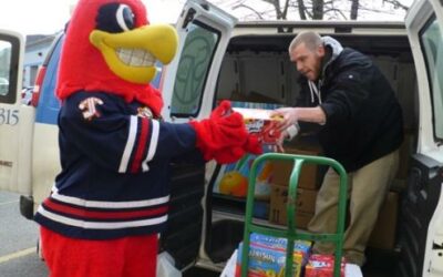JOHNSTOWN HOCKEYVILLE FOOD DRIVE MAKES HALF-TON DONATION