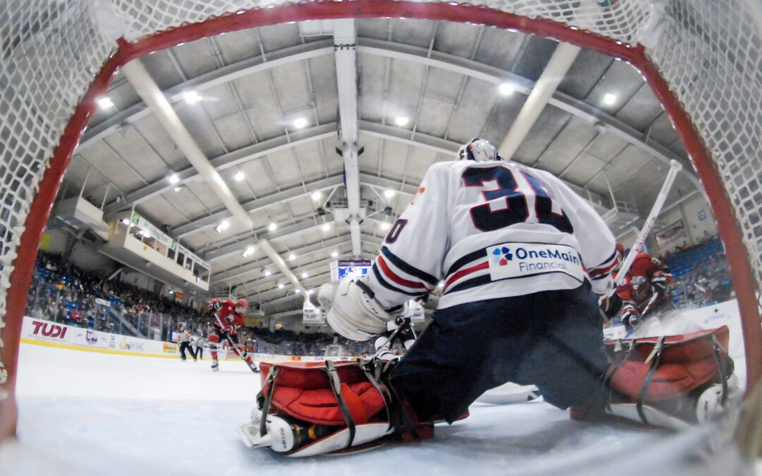 Ice Dogs Skate Past Tomahawks